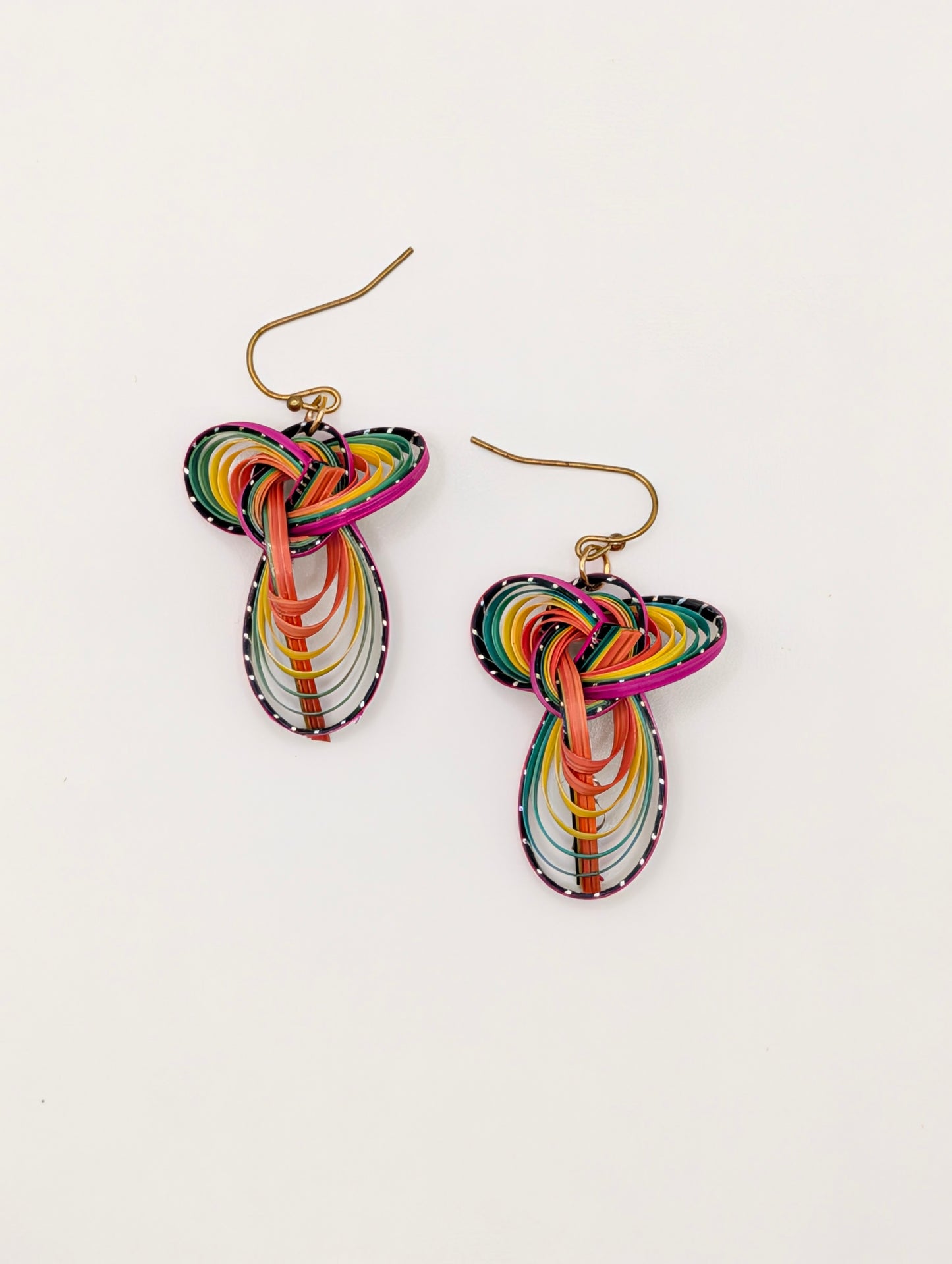 Colorful quilled earrings on a white background