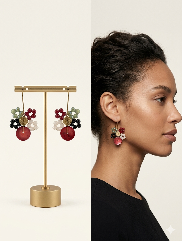Colorful earrings on a stand and worn by a model on a white background